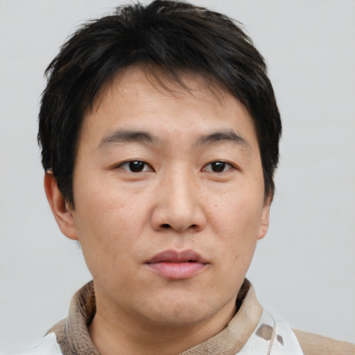 Neutral asian young-adult male with short  brown hair and brown eyes
