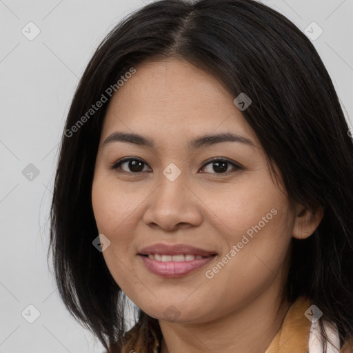 Joyful asian young-adult female with long  brown hair and brown eyes