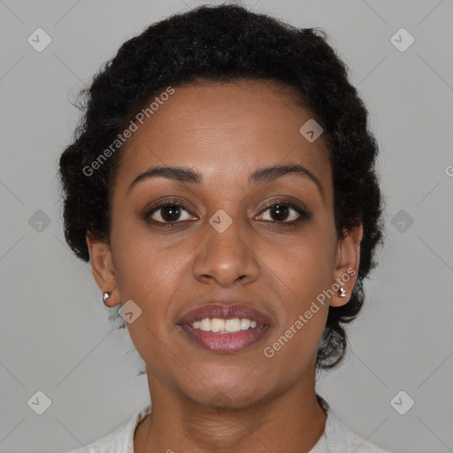 Joyful black young-adult female with short  brown hair and brown eyes