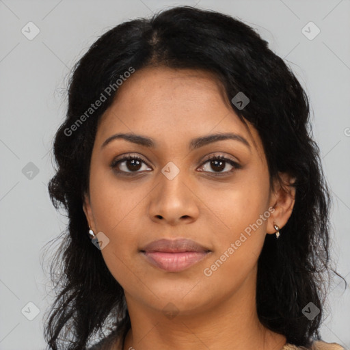 Joyful latino young-adult female with long  black hair and brown eyes