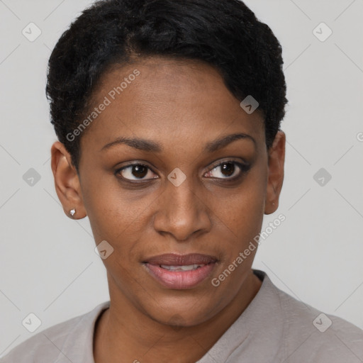 Joyful black young-adult female with short  black hair and brown eyes