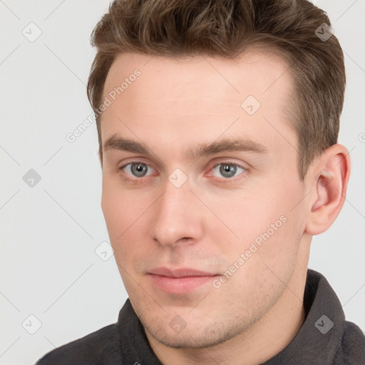 Neutral white young-adult male with short  brown hair and grey eyes