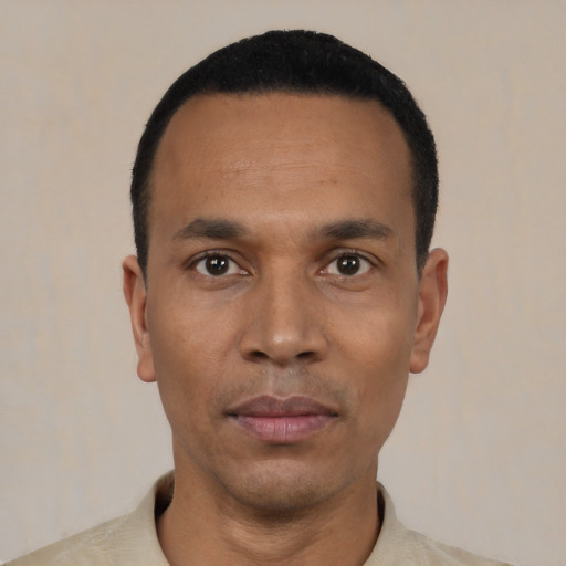 Neutral black adult male with short  black hair and brown eyes