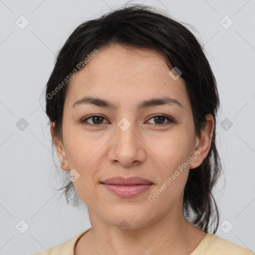 Joyful white young-adult female with medium  brown hair and brown eyes