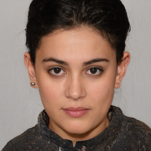 Neutral white young-adult female with short  brown hair and brown eyes