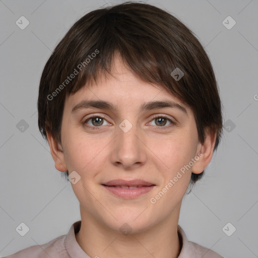 Joyful white young-adult female with medium  brown hair and grey eyes