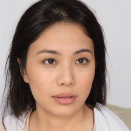 Neutral asian young-adult female with medium  brown hair and brown eyes