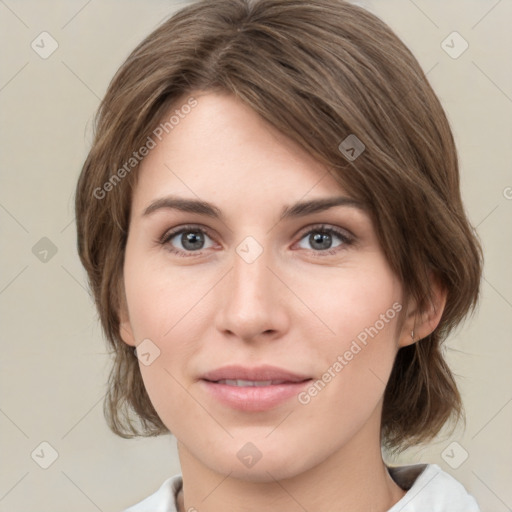 Joyful white young-adult female with medium  brown hair and green eyes