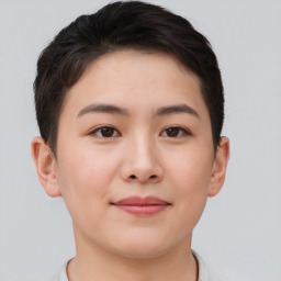 Joyful asian young-adult female with short  brown hair and brown eyes