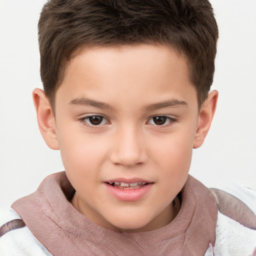 Joyful white child male with short  brown hair and brown eyes