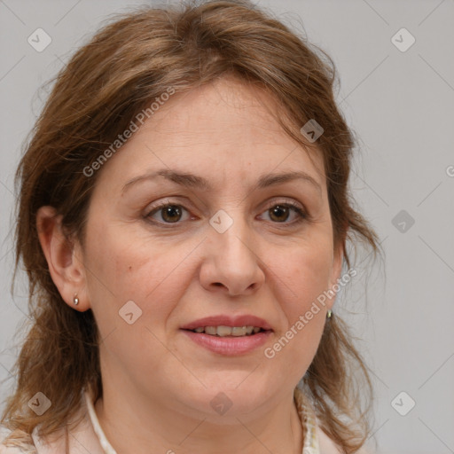 Joyful white adult female with medium  brown hair and brown eyes