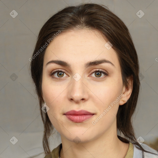 Neutral white young-adult female with medium  brown hair and brown eyes