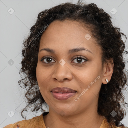 Joyful black young-adult female with medium  brown hair and brown eyes