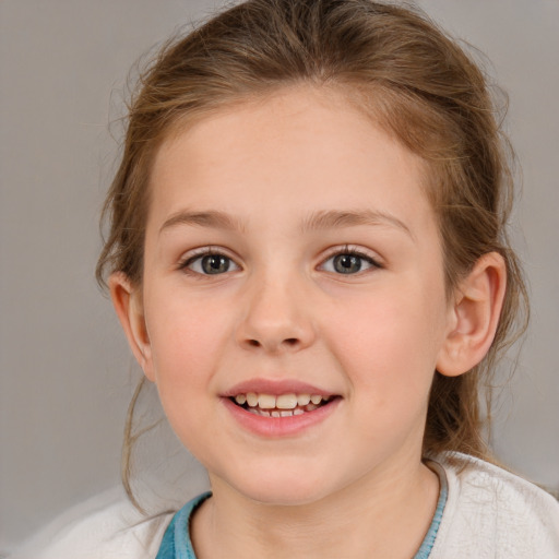 Joyful white child female with medium  brown hair and blue eyes