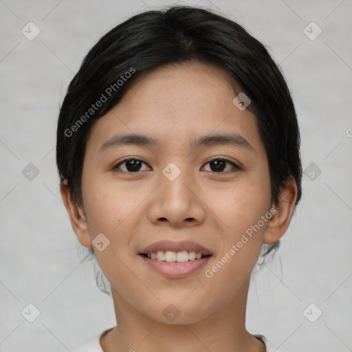 Joyful asian young-adult female with short  black hair and brown eyes