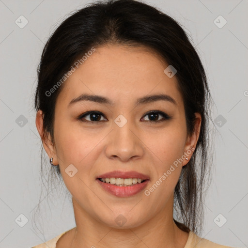 Joyful latino young-adult female with medium  brown hair and brown eyes