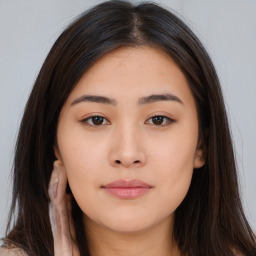 Neutral asian young-adult female with long  brown hair and brown eyes