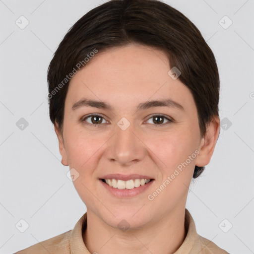 Joyful white young-adult female with short  brown hair and brown eyes