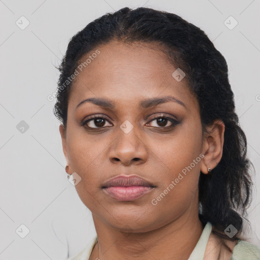 Neutral black young-adult female with short  brown hair and brown eyes