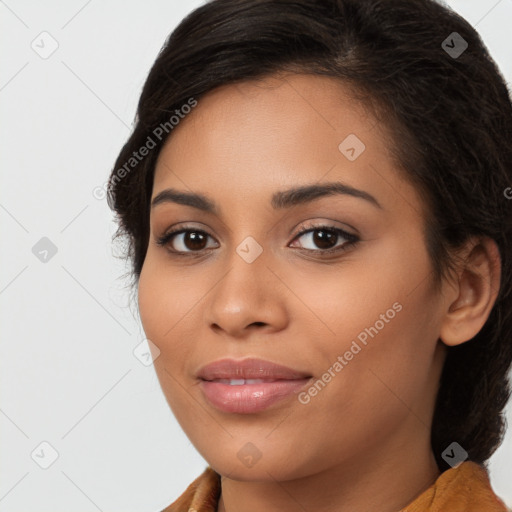 Joyful latino young-adult female with long  brown hair and brown eyes