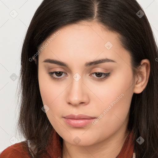 Neutral white young-adult female with long  brown hair and brown eyes