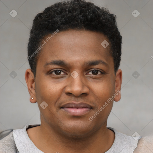 Joyful black young-adult male with short  black hair and brown eyes