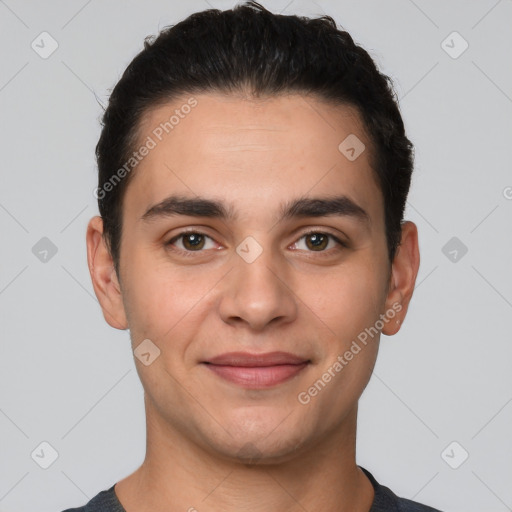 Joyful white young-adult male with short  brown hair and brown eyes