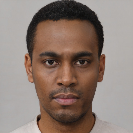 Neutral black young-adult male with short  black hair and brown eyes