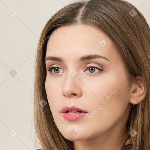 Neutral white young-adult female with long  brown hair and brown eyes