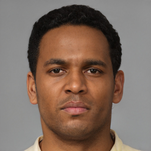Neutral black young-adult male with short  brown hair and brown eyes