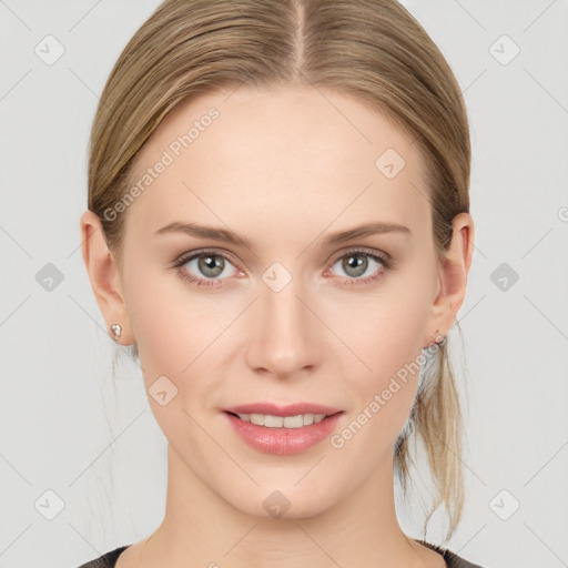 Joyful white young-adult female with medium  brown hair and blue eyes