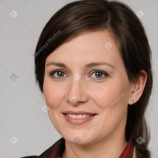 Joyful white young-adult female with medium  brown hair and brown eyes