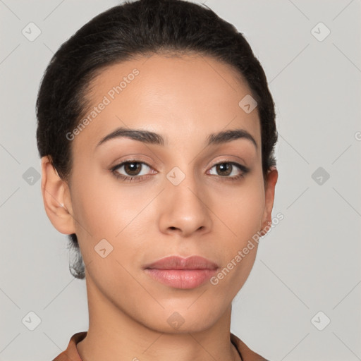 Joyful latino young-adult female with short  brown hair and brown eyes