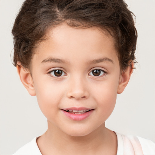 Joyful white child female with short  brown hair and brown eyes