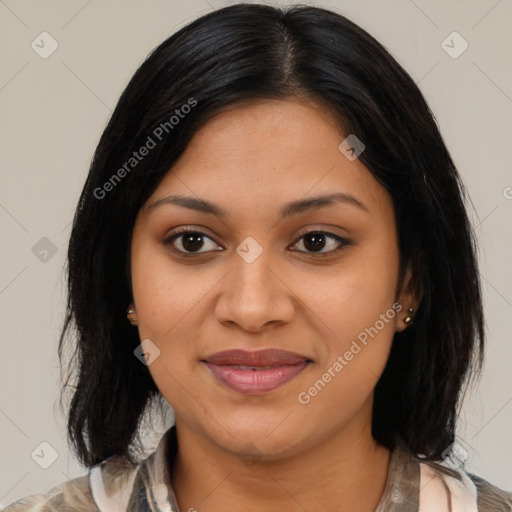 Joyful latino young-adult female with medium  brown hair and brown eyes