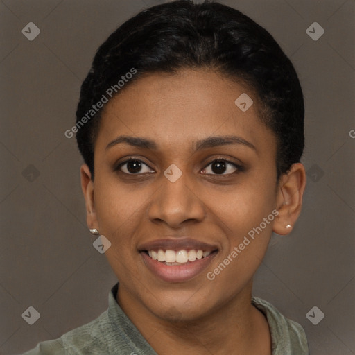 Joyful latino young-adult female with short  black hair and brown eyes