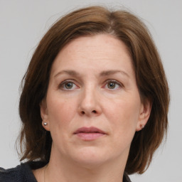 Neutral white adult female with medium  brown hair and brown eyes