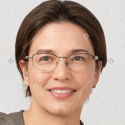 Joyful white adult female with short  brown hair and grey eyes