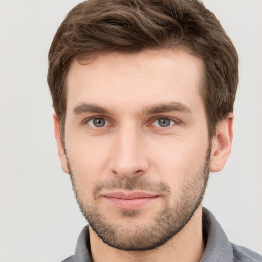 Neutral white young-adult male with short  brown hair and grey eyes