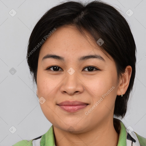 Joyful asian young-adult female with medium  brown hair and brown eyes