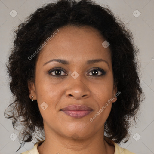 Joyful black young-adult female with medium  brown hair and brown eyes