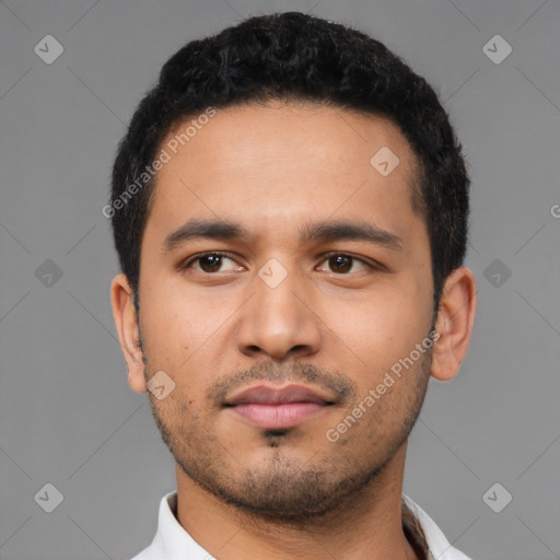 Neutral latino young-adult male with short  black hair and brown eyes