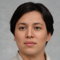 Neutral asian young-adult female with short  brown hair and brown eyes