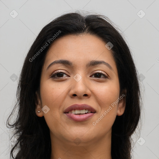 Joyful latino young-adult female with long  brown hair and brown eyes