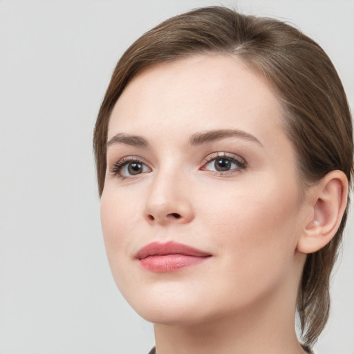 Neutral white young-adult female with long  brown hair and grey eyes