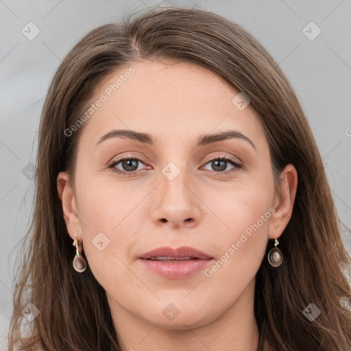 Joyful white young-adult female with long  brown hair and grey eyes