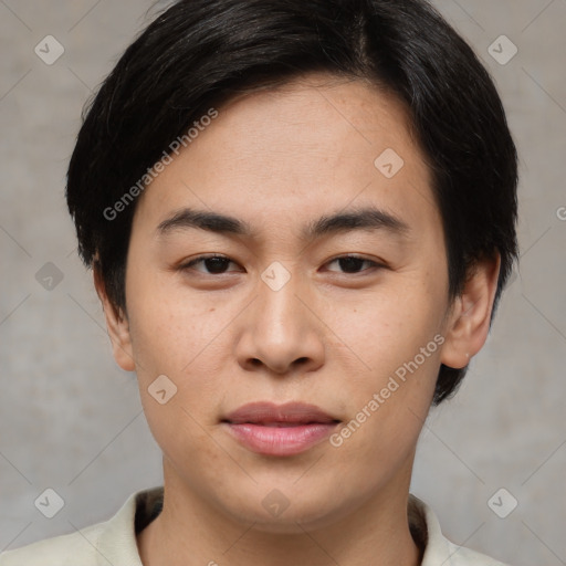 Joyful asian young-adult male with short  brown hair and brown eyes