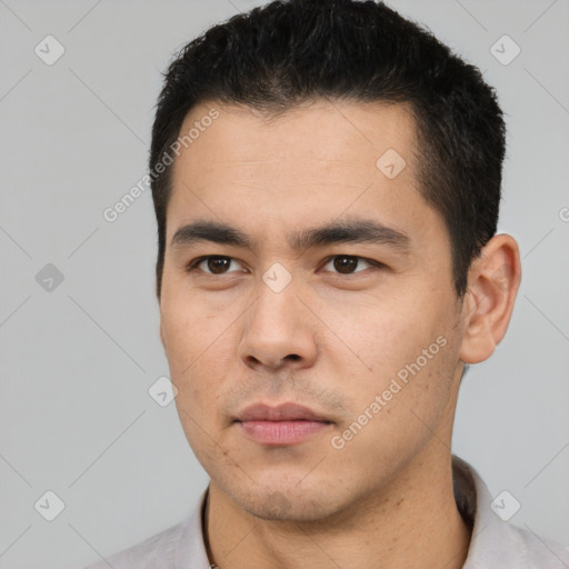 Neutral latino young-adult male with short  black hair and brown eyes