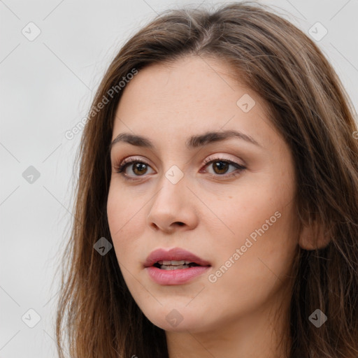 Neutral white young-adult female with long  brown hair and brown eyes