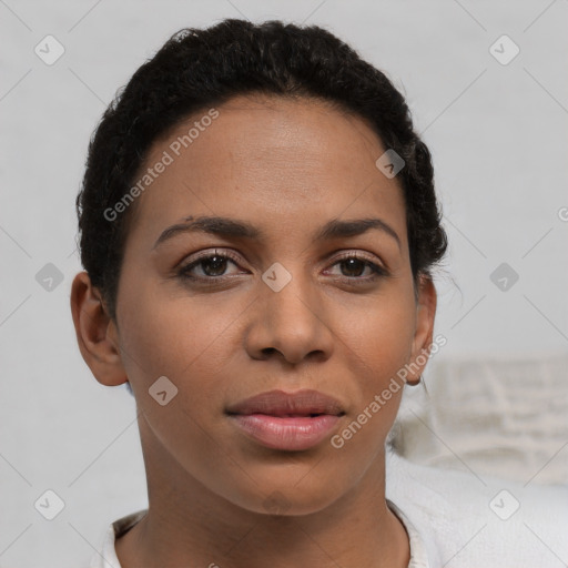 Joyful latino young-adult female with short  brown hair and brown eyes